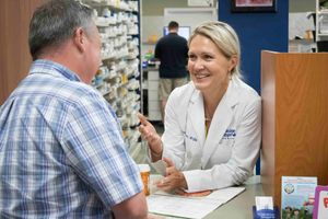 Maxton pharmacist with a customer